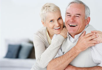 An older couple smiling together