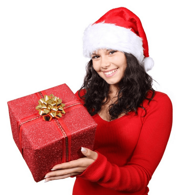A young woman in Christmas garb displays her red present