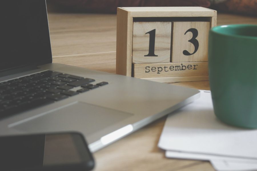A desk with a date showing September 13th