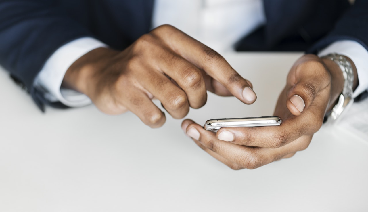 Hands using a smartphone