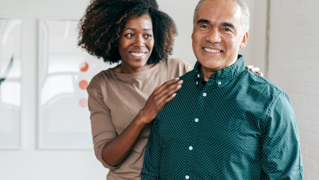 Adult senior and his caregiver