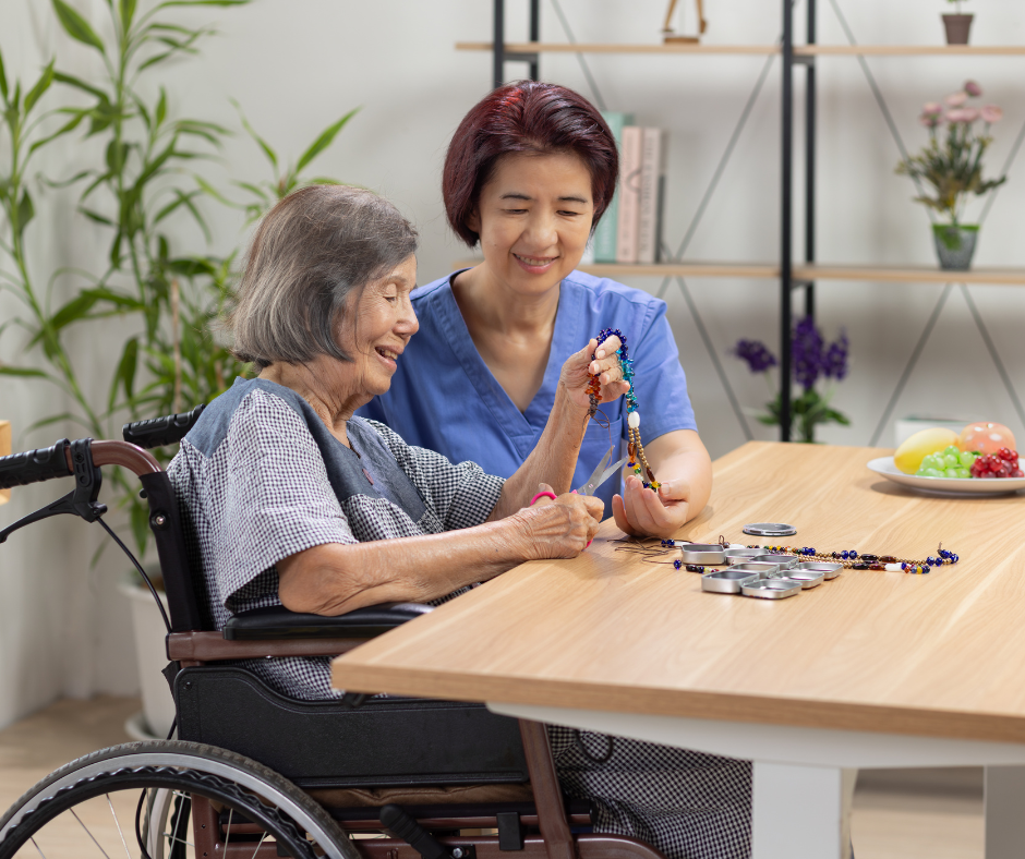 Caregiver and senior working on a puzzle