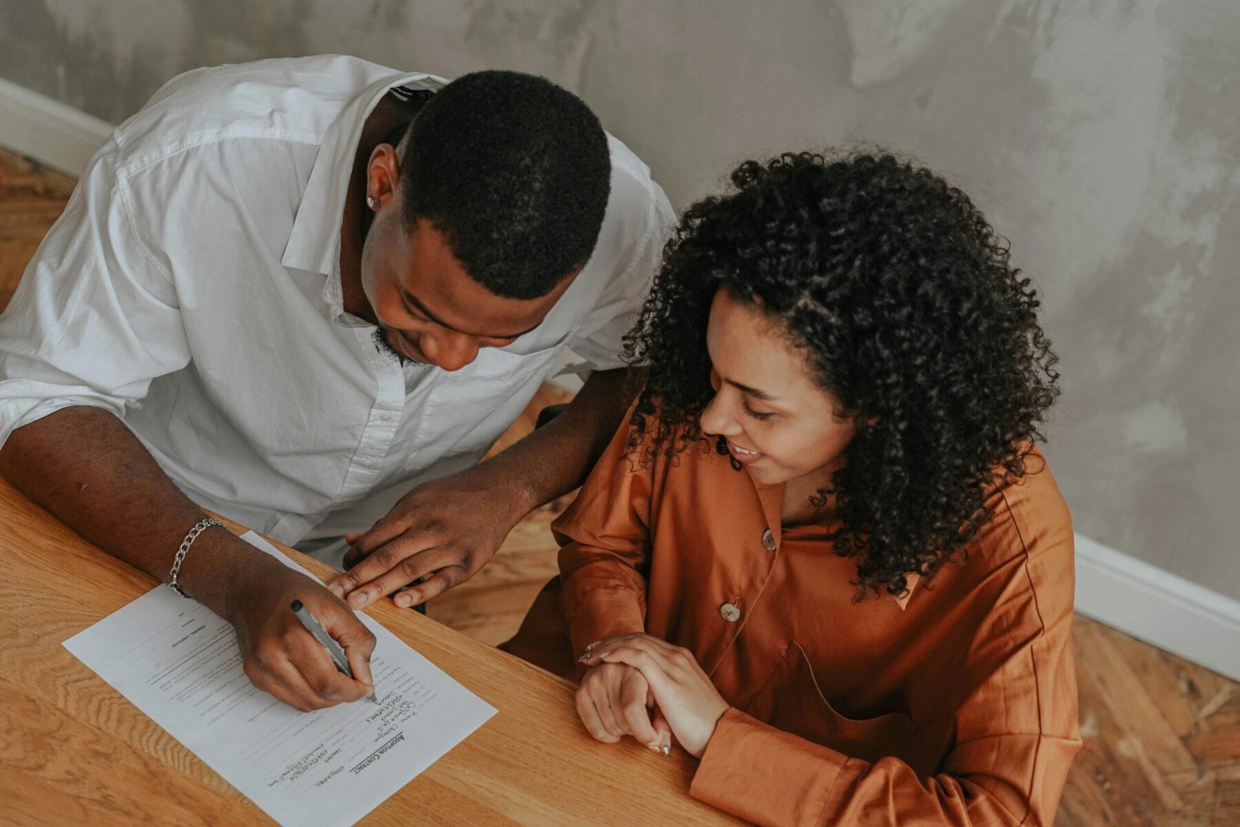 couple filling out paperwork