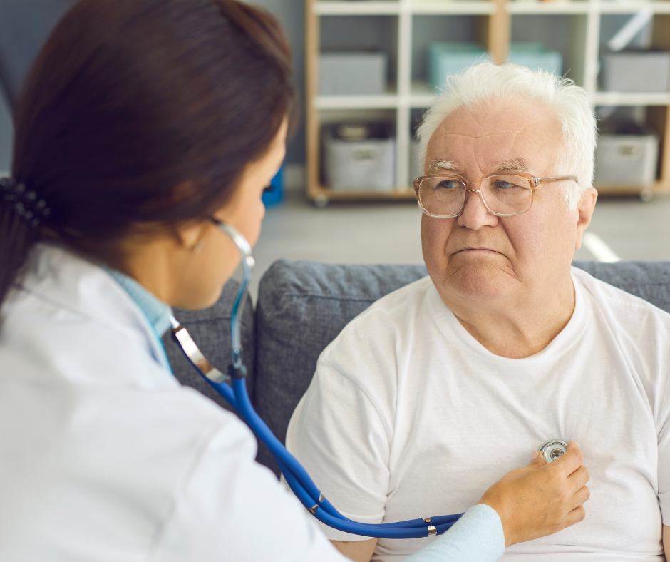 Doctor using a stethoscope to listen to her pneumonia patient's breathing